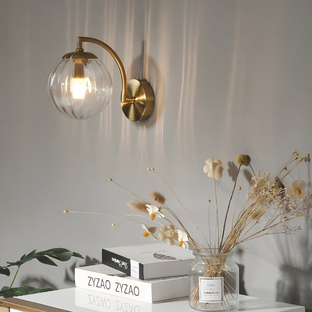 Modern Curved Arm Wall Sconce with Ribbed Glass Ball Shade