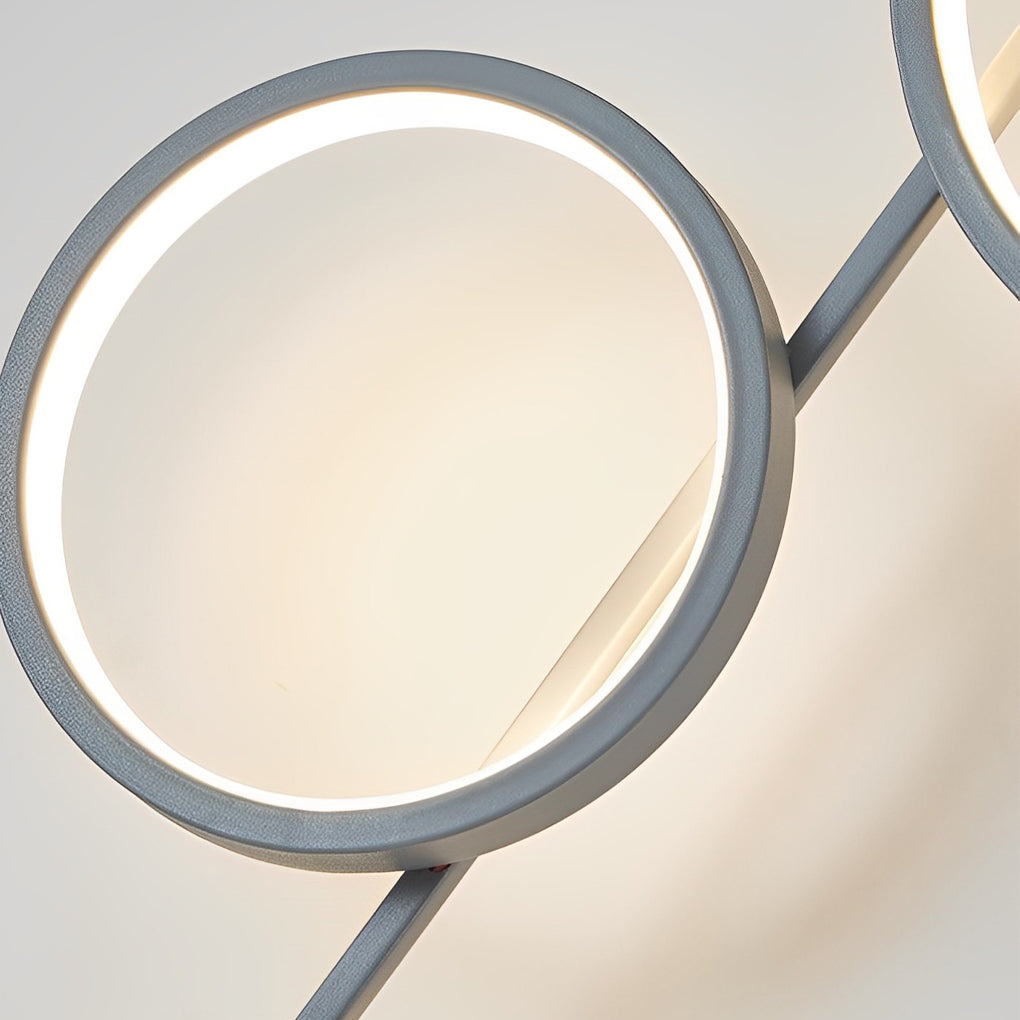 Modern Circular LED Wall Sconce with Artistic Strip Design