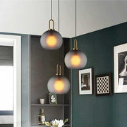 Nordic Industrial Glass Globe Pendant Light with Metal Frame