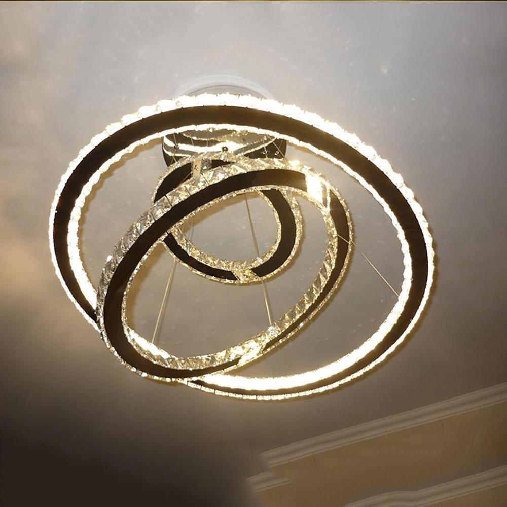 Modern Crystal Chandelier with Interwoven Geometric Rings